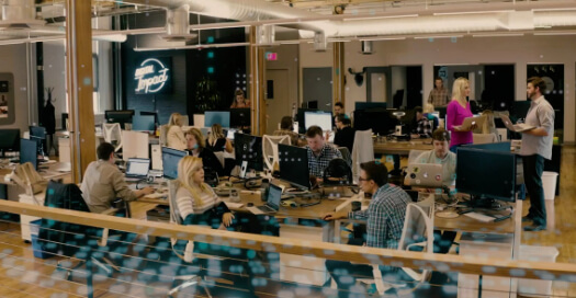 The Rocket55 office is busy and fast-paced during the workday